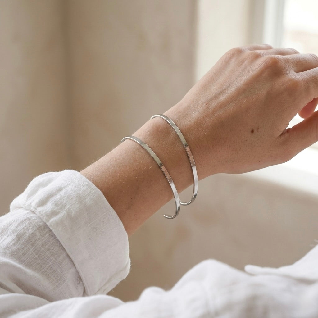 Twin Cuff · Armreif-Duo Stahl & Gold
